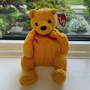 Poopsie the Yellow Bear with red ribbon Ty beanie baby 2001 7” tall mint condit